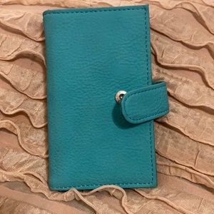 Turquoise colored mini card holder